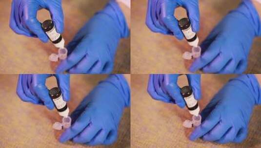 实验员戴手套试管采样加入重金属测试液高清在线视频素材下载