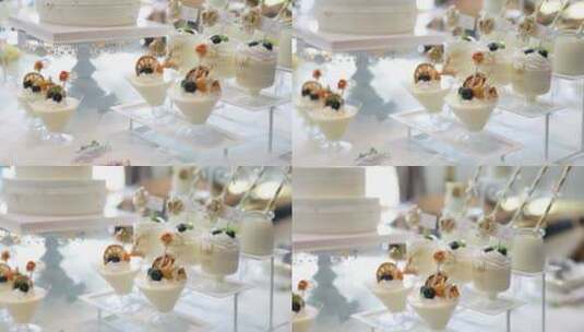 订婚典礼上的蛋糕甜点和场地花朵高清在线视频素材下载
