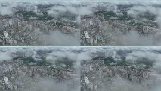 航拍云海中的广州越秀区城市建筑高清在线视频素材下载