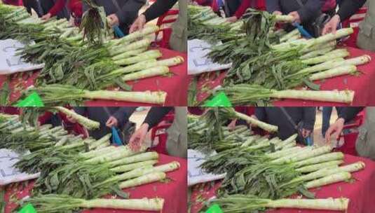 顾客挑选莴笋菜市场卖莴笋高清在线视频素材下载