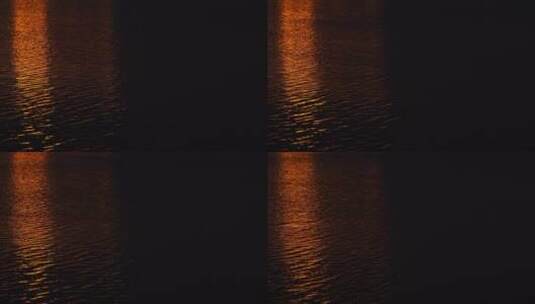 夜晚湖面水面海面灯光波光粼粼俯拍特写波纹高清在线视频素材下载