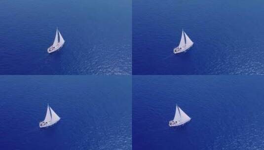 帆船行驶在蓝色海洋中扬帆起航高清在线视频素材下载