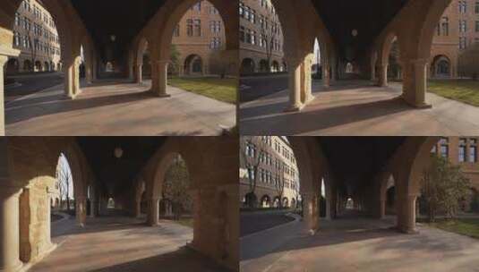 阳光照射在欧式建筑圆形拱门走廊高清在线视频素材下载