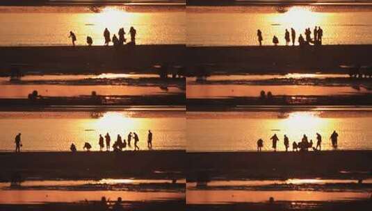 威海高区小石岛 沙滩上的赶海人高清在线视频素材下载