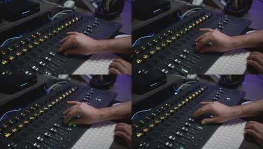 一位声音制作人正在录音室使用带有编辑工具的音乐混音器高清在线视频素材下载