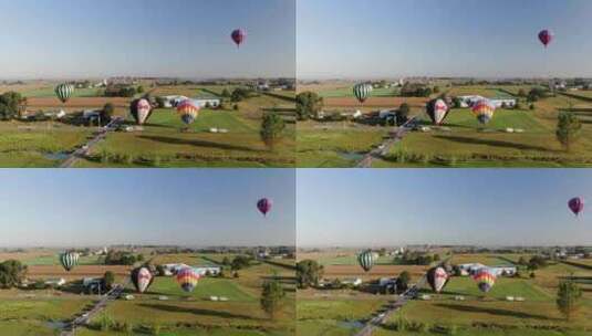 当热气球着陆并在宾夕法尼亚州兰开斯特县移动时，静态无人驾驶飞机拍摄高清在线视频素材下载