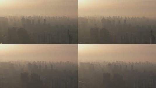 高楼迷雾清晨日出航拍高清在线视频素材下载