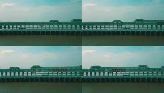 平移跟踪万福闸桥上行驶的车辆高清在线视频素材下载
