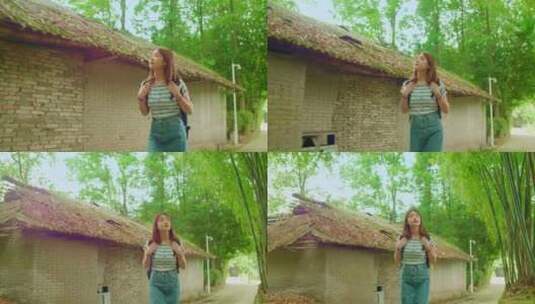 女孩漫步竹林欣赏古老乡村田间风景高清在线视频素材下载