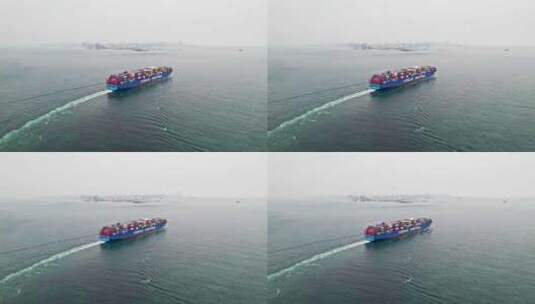 中国 山东青岛远洋货轮在大海上航行高清在线视频素材下载