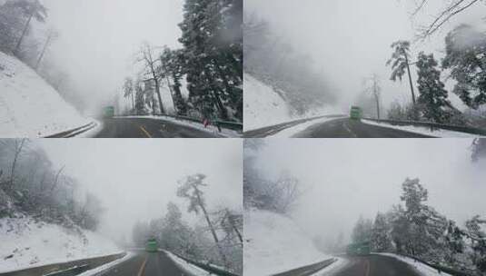 山间雪景盘旋公路：行车记录前方大巴车行驶高清在线视频素材下载