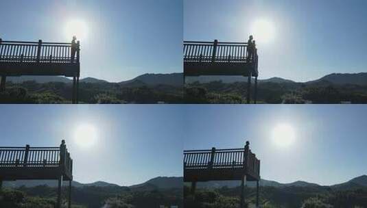 男子于观景台眺望远方山峦高清在线视频素材下载