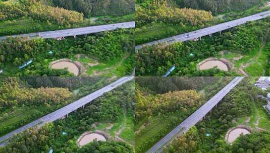 城市鸟瞰图，公路旁林立的高楼与绿植高清在线视频素材下载