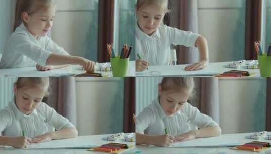 女孩用画笔画画时开心的笑了高清在线视频素材下载