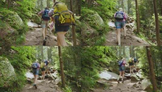 背包客攀登崎岖的山路高清在线视频素材下载