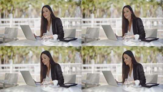 漂亮的女人使用笔记本电脑工作高清在线视频素材下载