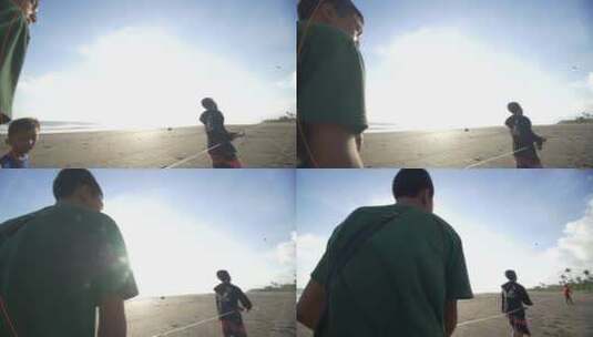 小男孩在海滩放风筝高清在线视频素材下载