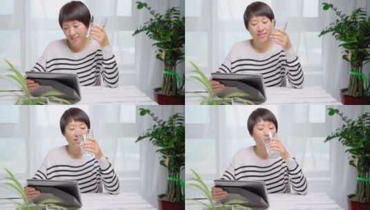 居家办公书写的中国女性形象高清在线视频素材下载