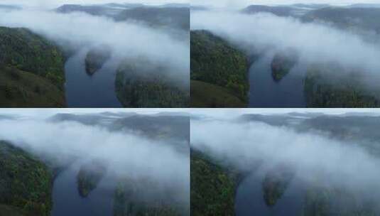 航拍大兴安岭秋季下雨时山林河湾云雾高清在线视频素材下载