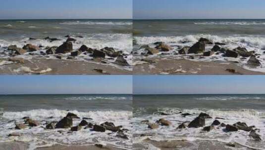 肮脏的海水冲破岩石高清在线视频素材下载