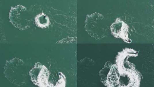 航拍俯瞰海面上嬉水的一条快艇高清在线视频素材下载
