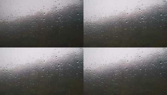 实拍车窗外雨滴滴水高清在线视频素材下载