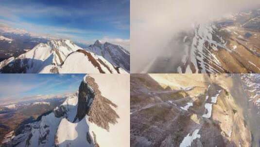 穿越机航拍穿越雪山山脊云层高清在线视频素材下载