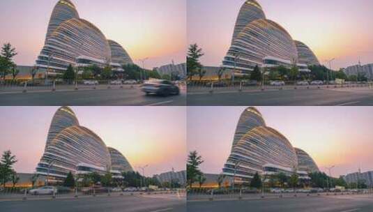 北京地标写字楼建筑望京SOHO日转夜车流延时高清在线视频素材下载