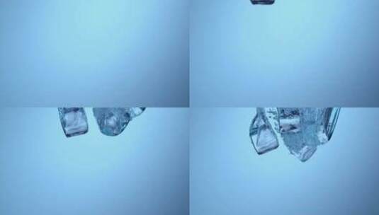 注入水中的冰块特写高清在线视频素材下载