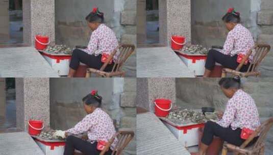 浔埔村女人敲海蛎蟳埔蟳蜅村农村妇女生活高清在线视频素材下载