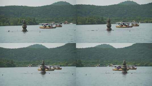 游客划船在西湖三潭印月游玩高清在线视频素材下载