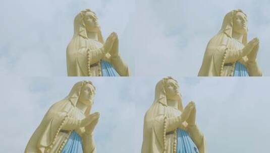 蓝天下基督教圣母玛利亚雕像高清在线视频素材下载