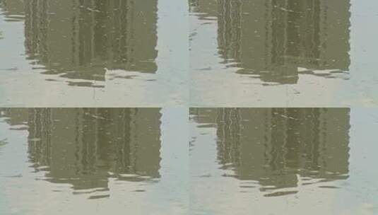 湖泊水面雨滴建筑倒影高清在线视频素材下载
