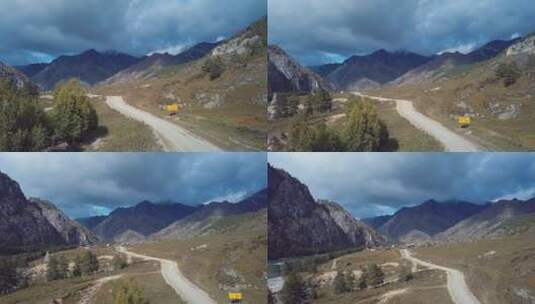 航拍山路和远处的村庄高清在线视频素材下载