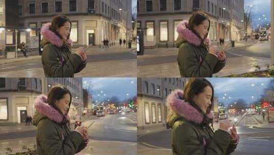 年轻女子在伦敦街头使用手机高清在线视频素材下载
