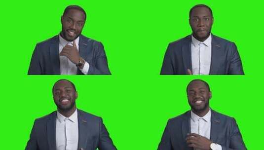 绿色屏幕上英俊微笑的男子汉。非裔美国商人诱惑地看着阿尔法频道背景下的相机。诱惑和男子气概的概念。高清在线视频素材下载