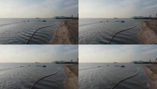 渔船在填海区附近移动高清在线视频素材下载