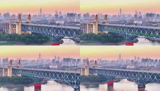 航拍清晨南京长江大桥日出车流铁路紫峰高清在线视频素材下载