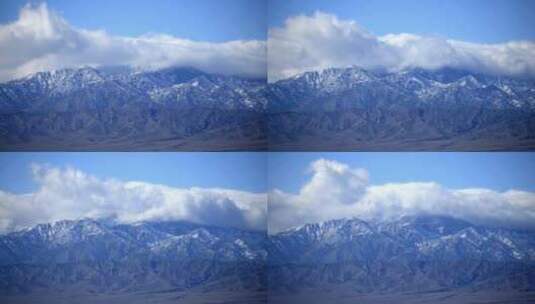 冬天有云的雪山高清在线视频素材下载