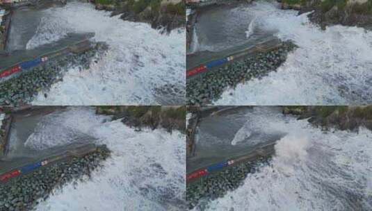 巨大的泡沫海浪撞击热那亚石港码头破浪器。高清在线视频素材下载