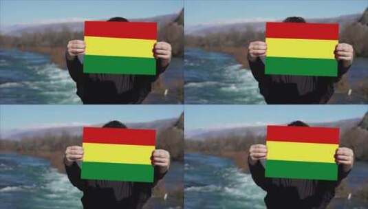 手持玻利维亚国旗旗帜的人高清在线视频素材下载