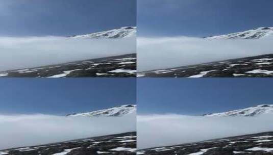 航拍特写阿尔卑斯高耸入云的雪山云雾缭绕高清在线视频素材下载