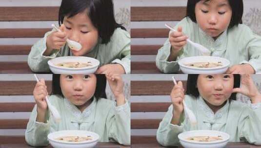 可爱小女孩开心的吃豆腐花微笑甜蜜高清在线视频素材下载