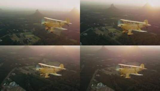 空对空，轻型飞机，黄色，飞行高清在线视频素材下载