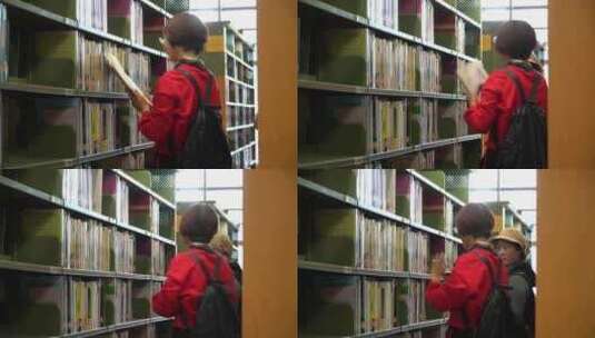 大学生图书馆安静查阅书籍高清在线视频素材下载