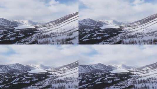 航拍新疆冬季喀纳斯湖雪景雪山森林冰河晨雾高清在线视频素材下载