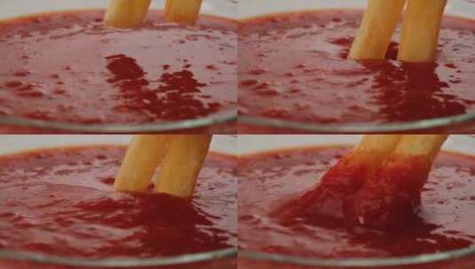 在红番茄或番茄酱酱中倒入油炸土豆特写吃薯高清在线视频素材下载