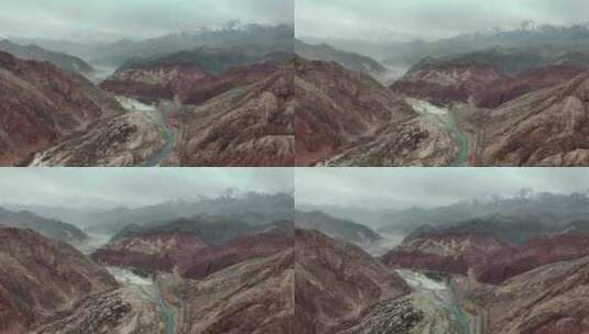 新疆奥依塔克红山谷奥依塔克河远处为雪山高清在线视频素材下载