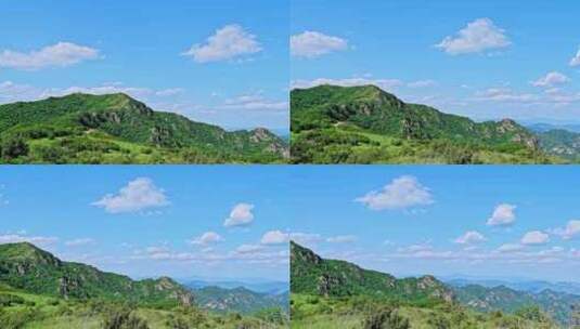 夏季蓝天白云绿色大山山顶全景风光高清在线视频素材下载