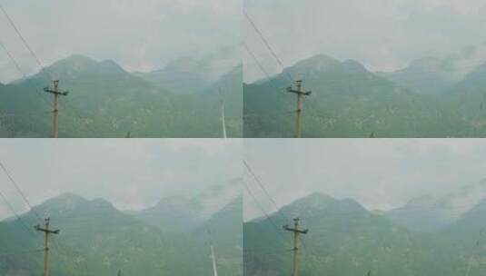 大山电线电线杆空山雾气高清在线视频素材下载